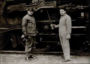 Honegger in front of a locomotive but it isn't a Pacific 231!